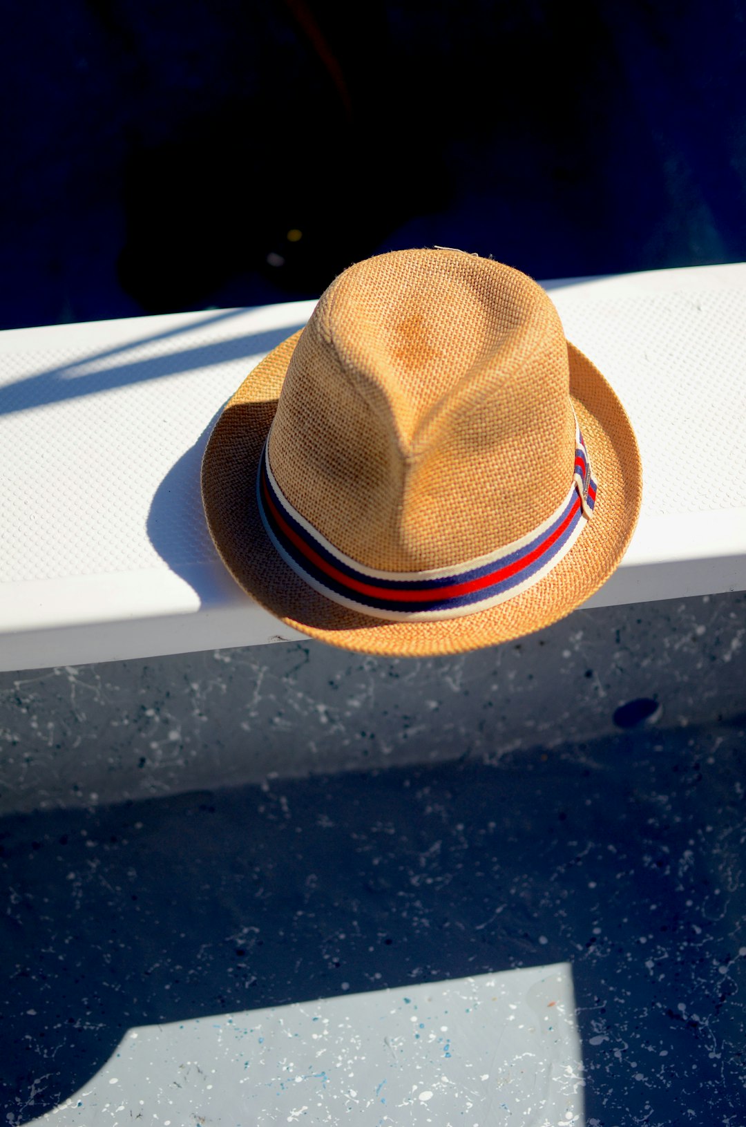 Fedora hat on a boat
